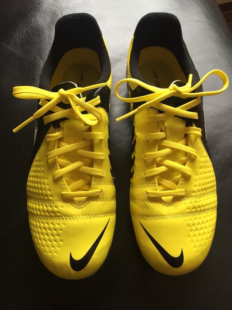 yellow and black nike football boots